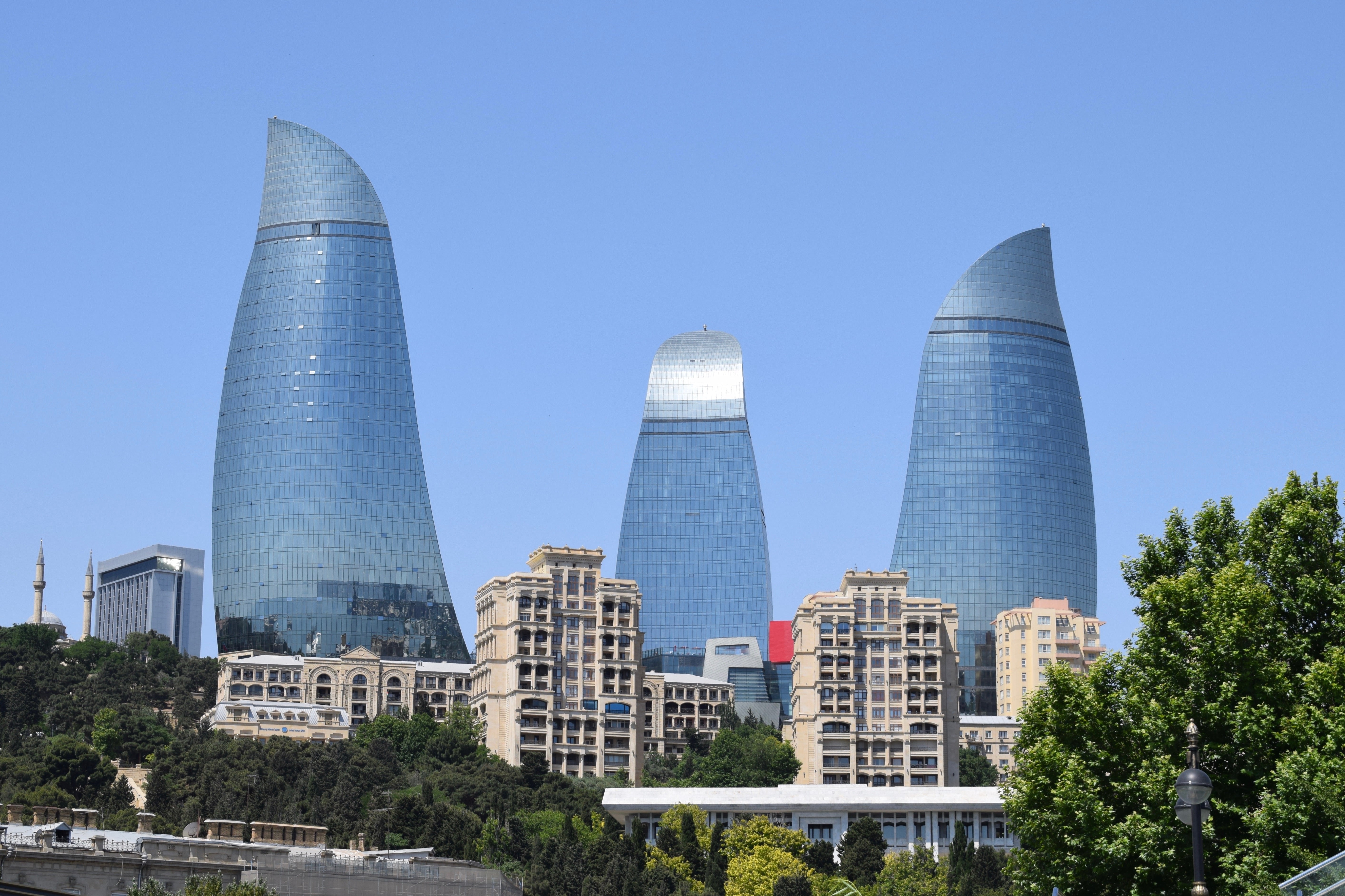Flame Towers skyscrapers with a blue sky background, Baku
