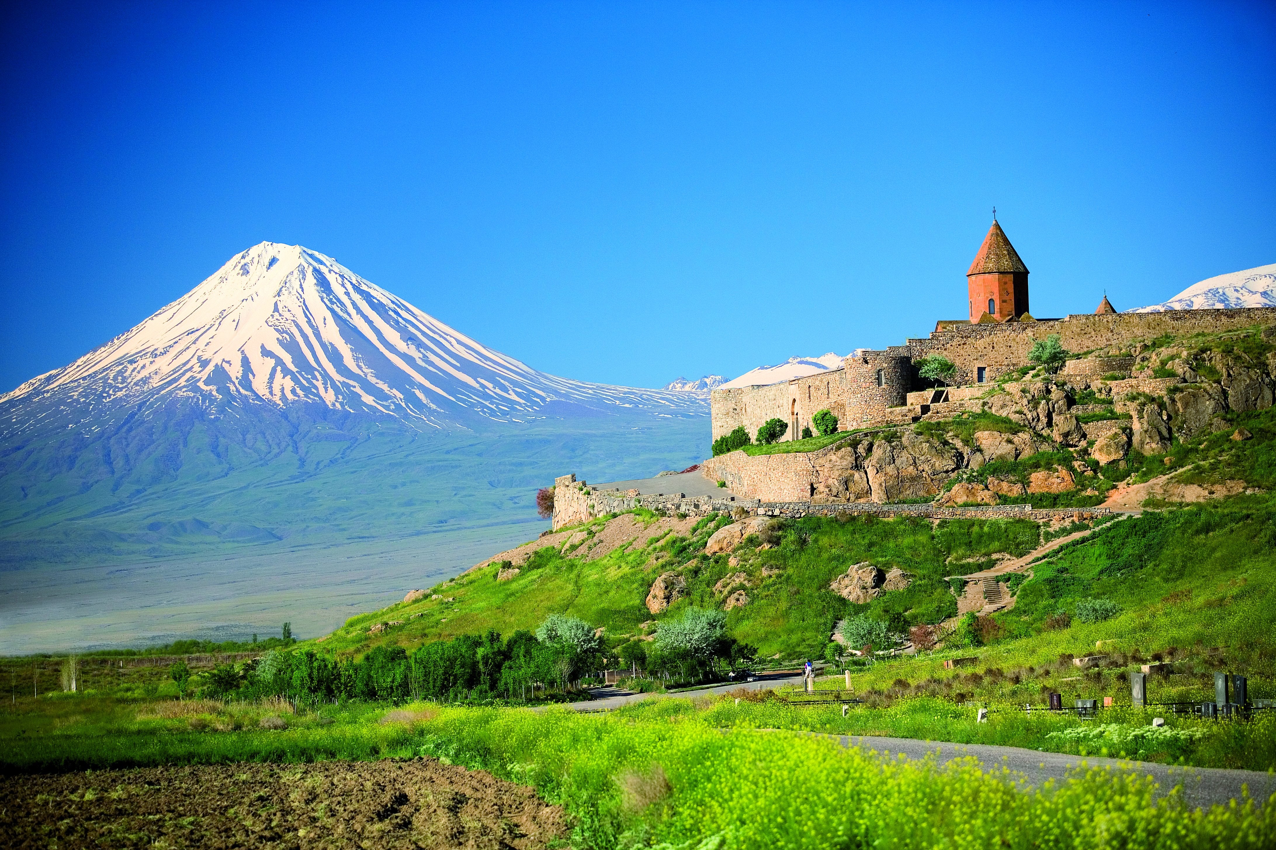 Castle on a hill with Mount Ararat in the background